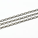 Antique Brass, Flat Oval Chain, 4.5x2mm, sold by foot