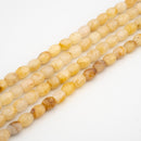 Yellow Jade Faceted Drum 14x11mm
